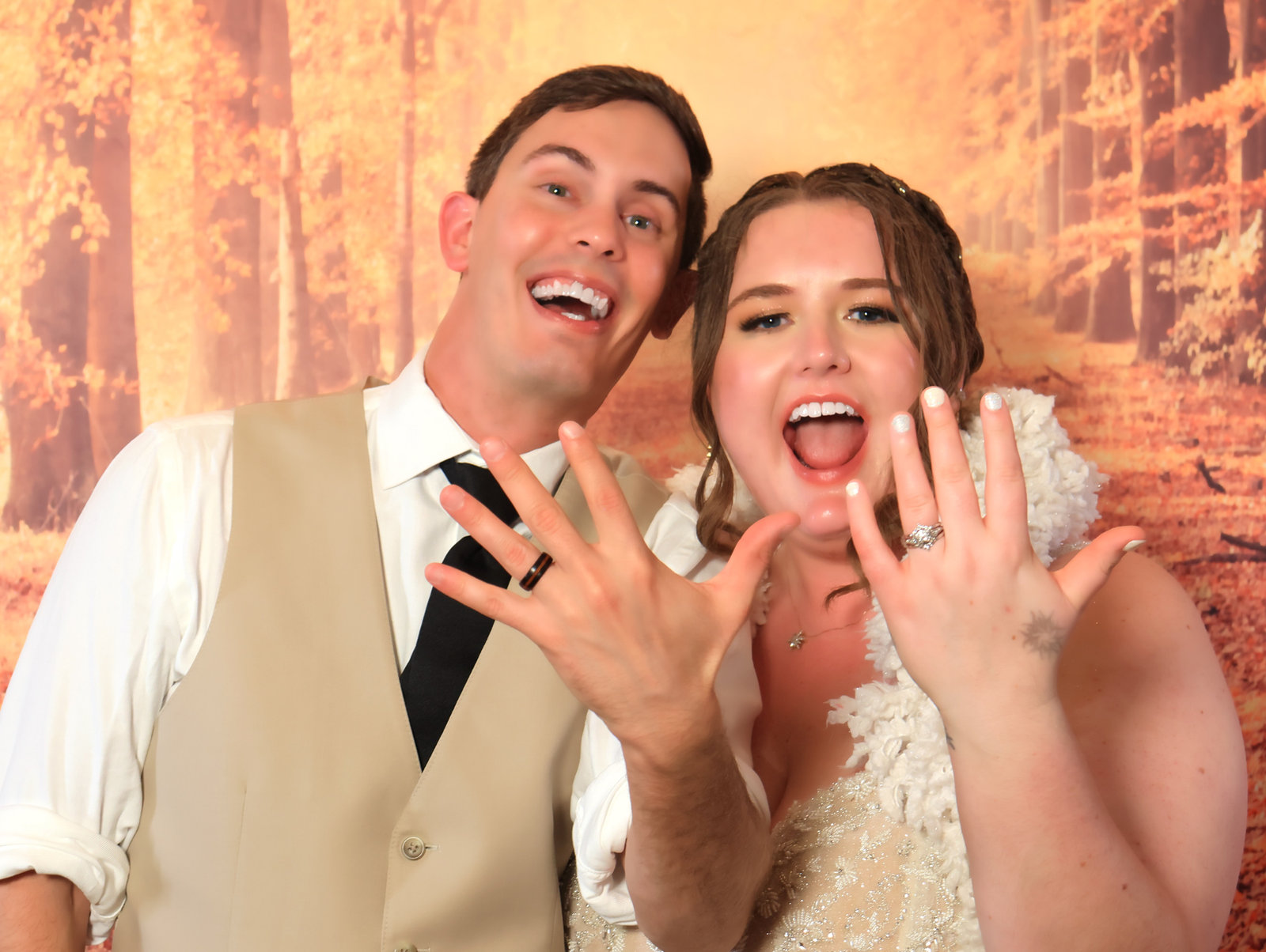 Couple showing off their rings