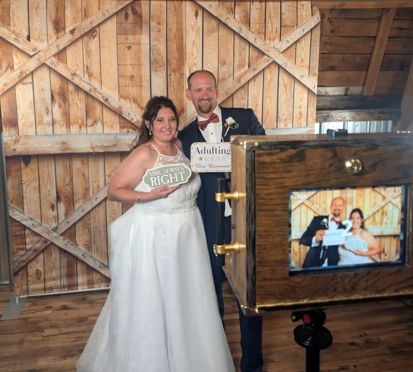Bride beside the handcrafted wooden Craftsman booth