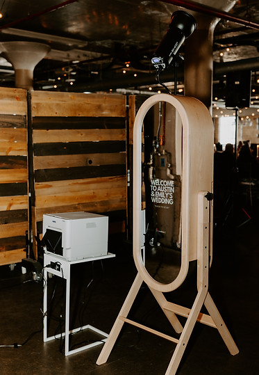 The Luxe Mirror showing a welcome message at a wedding venue