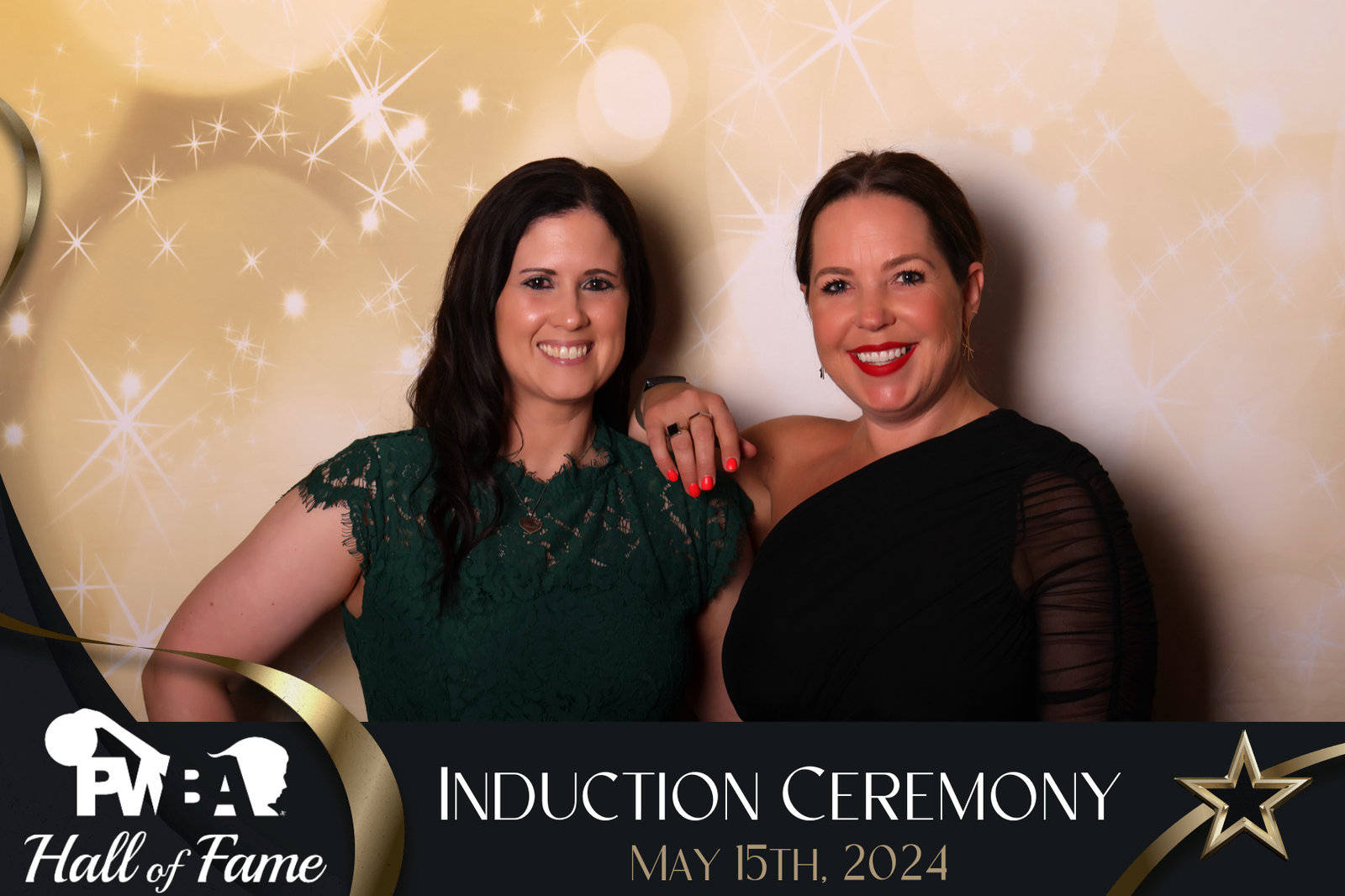 Two honorees at a Hall of Fame induction ceremony