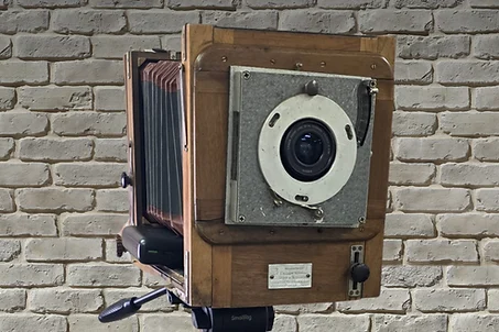 The genuine 1920s Heirloom camera, with its bellows and nickel lens plate